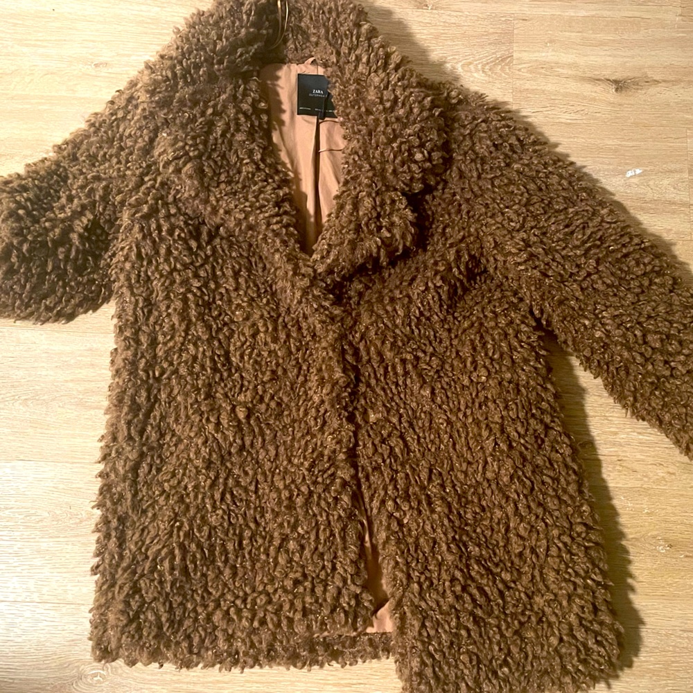 US XL Zara teddy jacket. Silk lining in jacket with two buttons.
